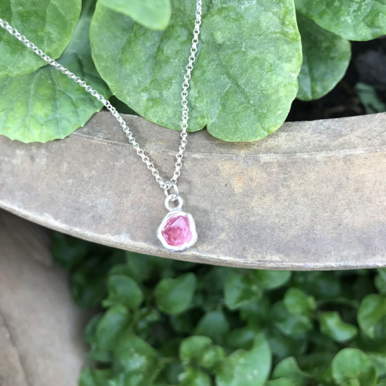 Raw red spinel pendant