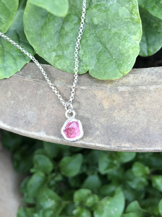 Raw red spinel pendant