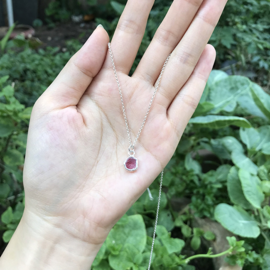 Raw red spinel pendant