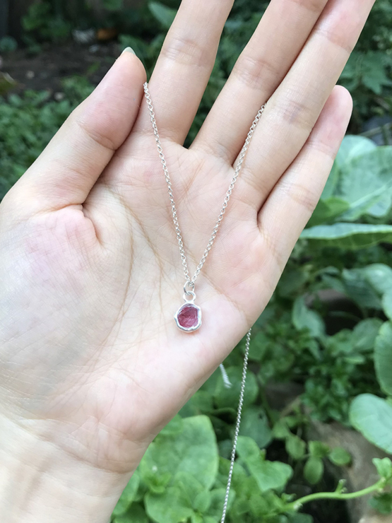 Raw red spinel pendant