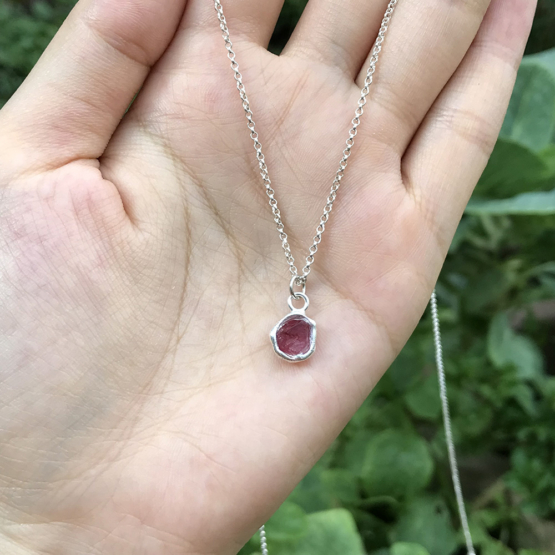 Raw red spinel pendant