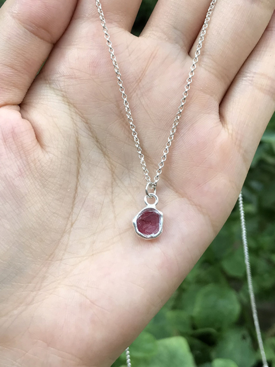 Raw red spinel pendant