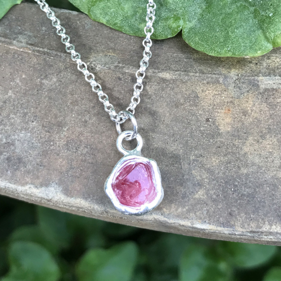 Raw red spinel pendant