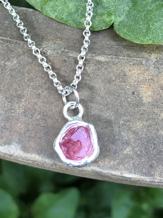 Raw red spinel pendant