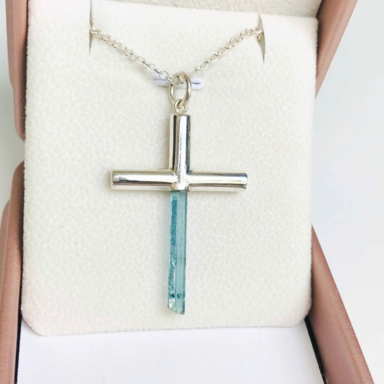 Aquamarine cross pendant- Long aquamarine crystal mounted in a sterling silver cross pendant