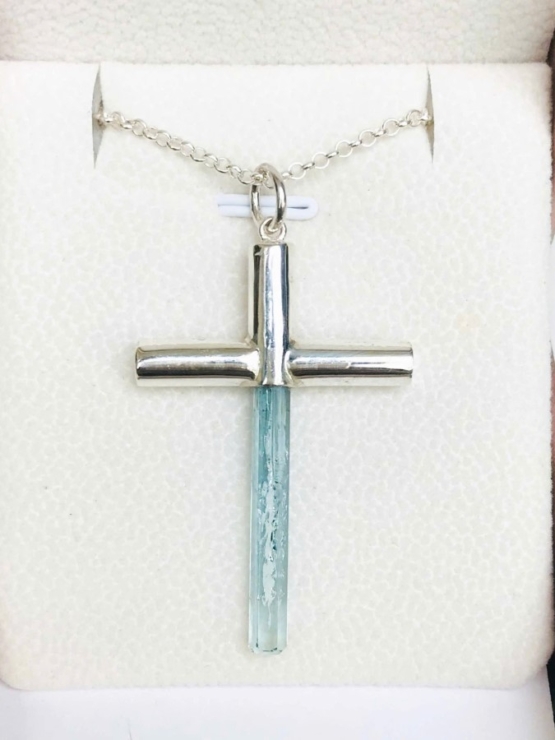 Aquamarine cross pendant- Long aquamarine crystal mounted in a sterling silver cross pendant