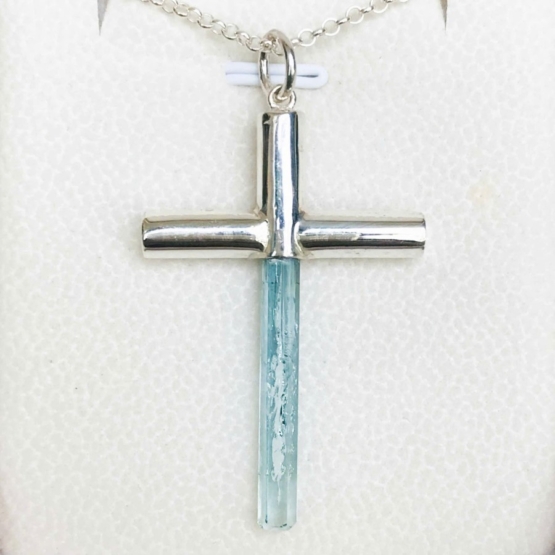 Aquamarine cross pendant- Long aquamarine crystal mounted in a sterling silver cross pendant